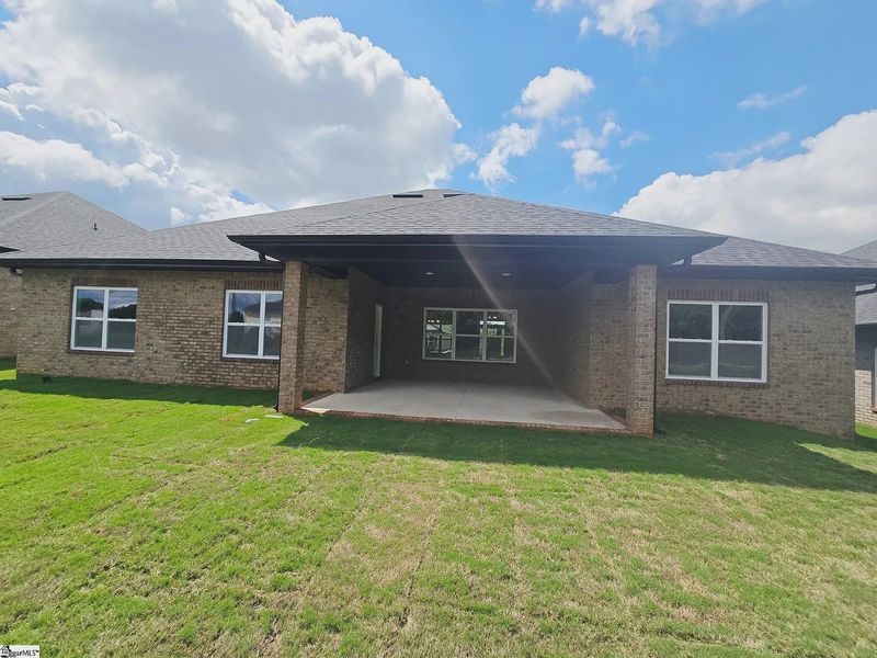 Exterior details and patio area of a home in Hidden Lake Estates, Greenville (Image 13).