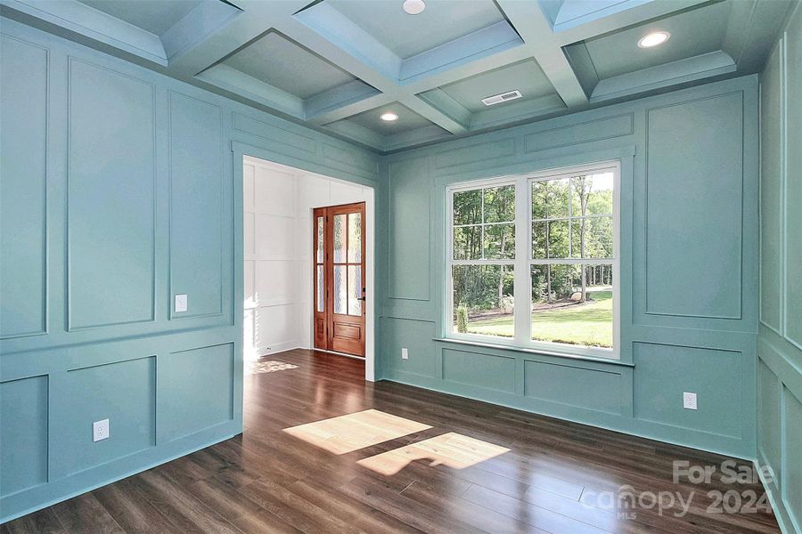 Formal dining room/flex room with coffered ceiling. Color drenched with sherwin williams color of the year, Upward.