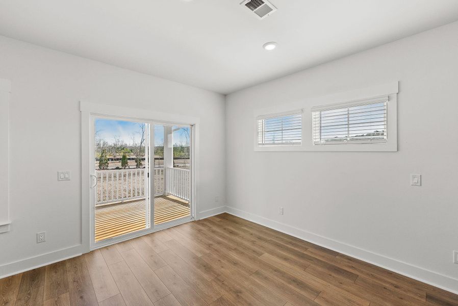 Spacious, unfurnished interior of a new home in The Coves at Lakes of Cane Bay, Summerville (Image 48). Spacious, unfurnished interior of a new home in The Coves at Lakes of Cane Bay, Summerville (Image 48).