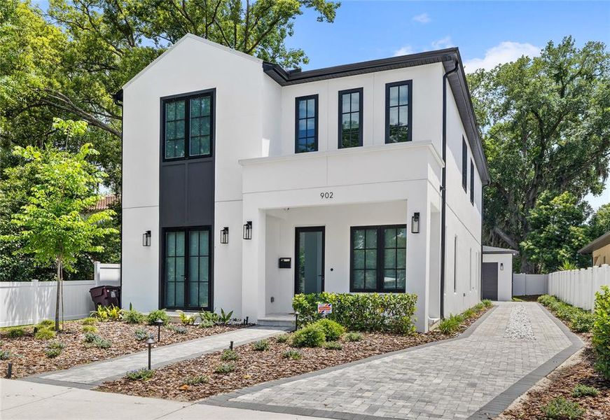 Front exterior of a new home in College Park, Orlando, FL, highlighting curb appeal (Image 25). Front exterior of a new home in College Park, Orlando, FL, highlighting curb appeal (Image 25).