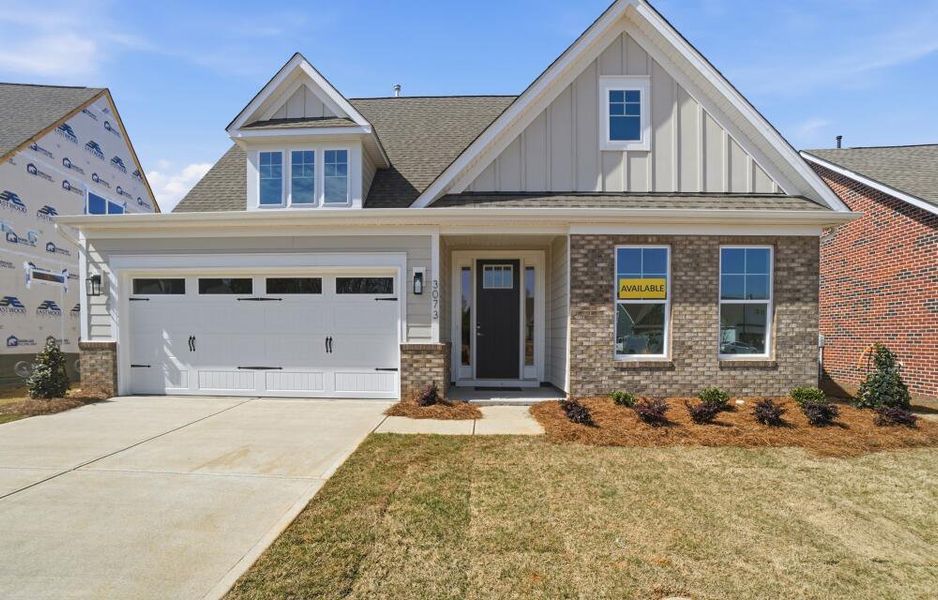 Front exterior of a new home in Founders Landing | 55+ Community, Gastonia, NC, highlighting curb appeal (Image 2). Front exterior of a new home in Founders Landing | 55+ Community, Gastonia, NC, highlighting curb appeal (Image 2).