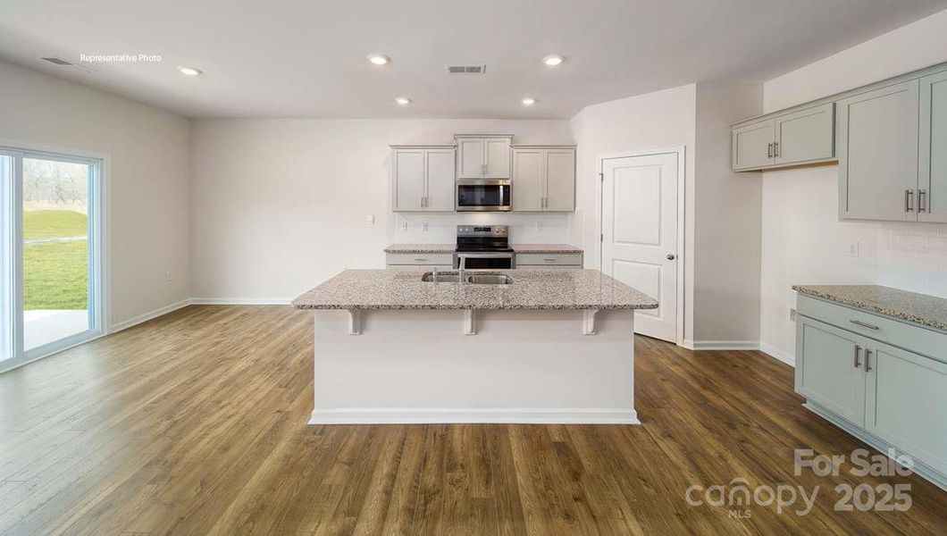 Furnished interior view inside a new home in Wallace Springs, Statesville (Image 1).