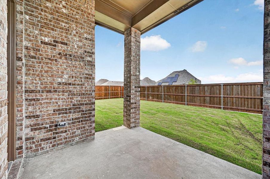 Exterior details and patio area of a home in Monterra, Fate (Image 2).