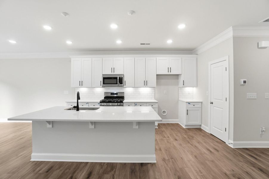 Furnished interior view inside a new home in Harrisburg Village Townhomes, Harrisburg (Image 10).
