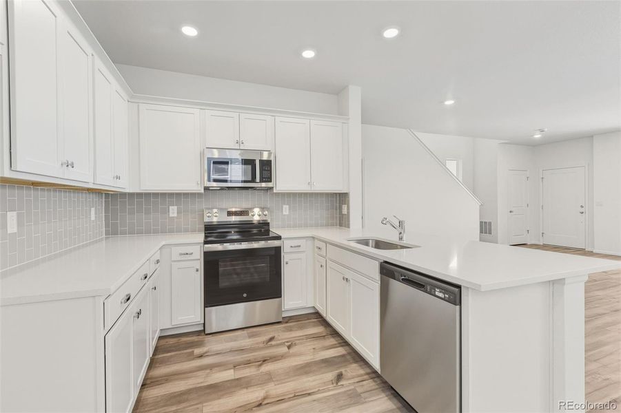 Furnished interior view inside a new home in Windler, Aurora (Image 5).
