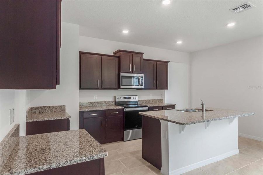 Furnished interior view inside a new home in Lakes of Mount Dora, Mount Dora (Image 4).