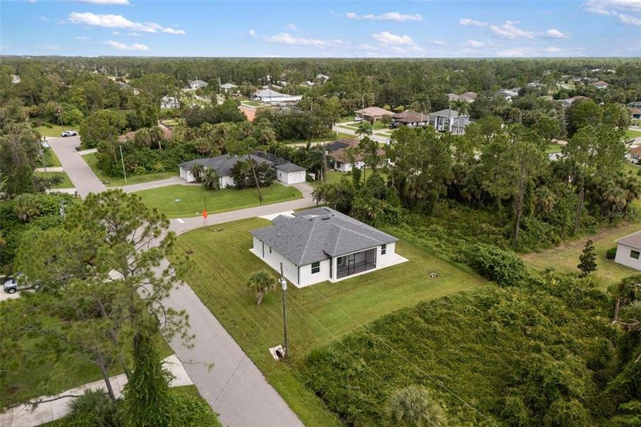 Front exterior of a new home in , North Port, FL, highlighting curb appeal (Image 24).