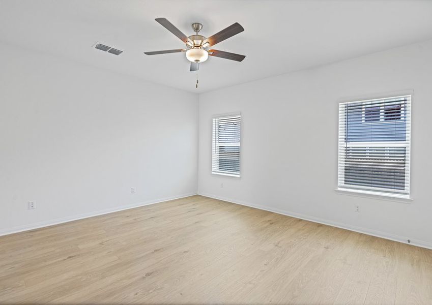 Family room with vinyl flooring and plenty of natural light