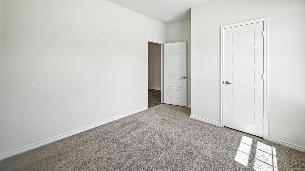 Spacious, unfurnished interior of a new home in Fireside by the Lake, Garland (Image 25).