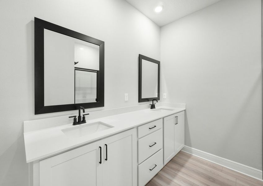 The master bathroom has this stunning dual-sink vanity