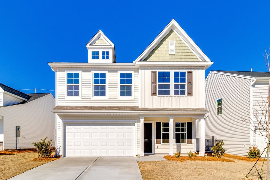 Front exterior of a new home in Bluefield, Lexington, SC, highlighting curb appeal (Image 1). Front exterior of a new home in Bluefield, Lexington, SC, highlighting curb appeal (Image 1).