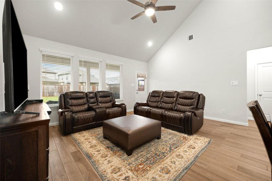 Large windows invite abundant natural light while providing views of the backyard. Large windows invite abundant natural light while providing views of the backyard.