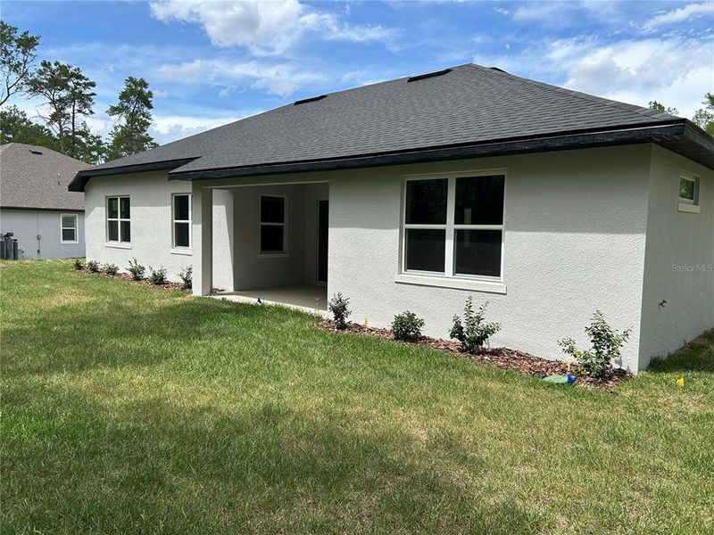 Exterior details and patio area of a home in , Brooksville (Image 13). Exterior details and patio area of a home in , Brooksville (Image 13).