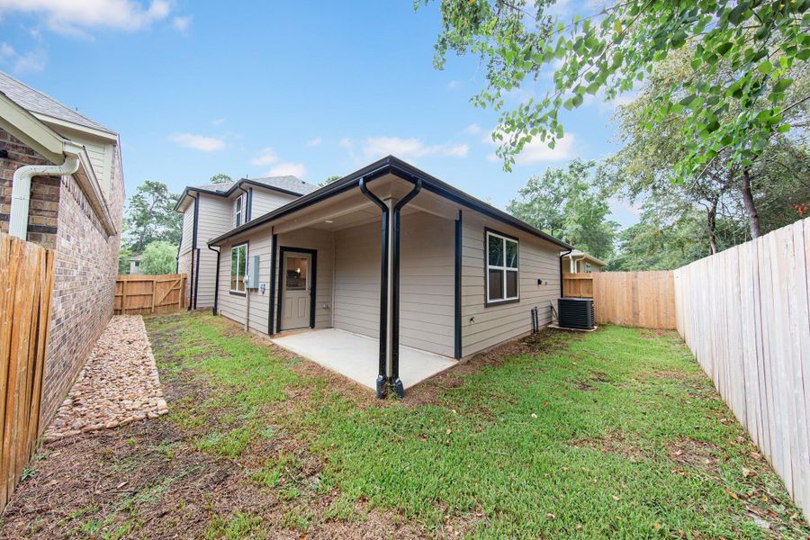 Front exterior of a new home in Lake Conroe Area Homes, Montgomery, TX, highlighting curb appeal (Image 13).