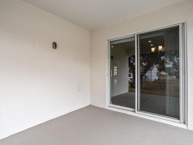 A covered lanai provides desirable outdoor living space.