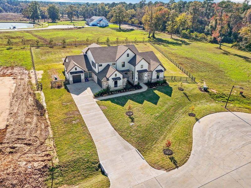 Front exterior of a new home in Bentwood Farms, Montgomery, TX, highlighting curb appeal (Image 29).