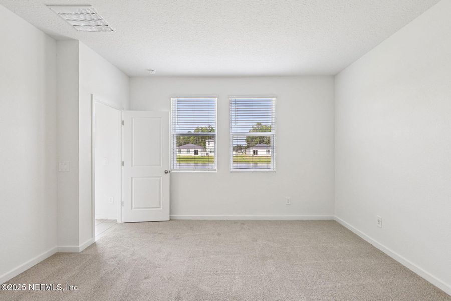 Spacious, unfurnished interior of a new home in Cypress Meadows - Classic Series, Jacksonville (Image 28).