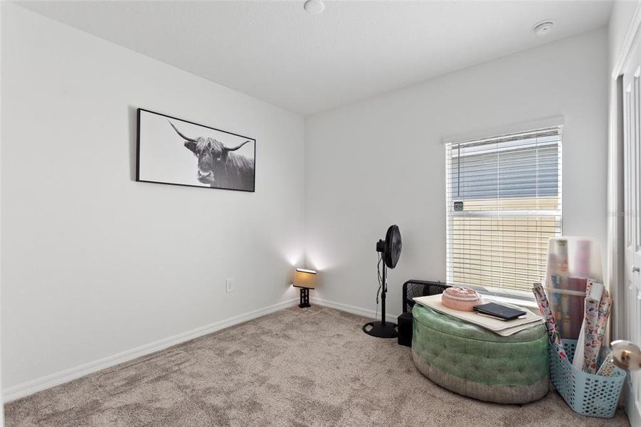 Furnished interior view inside a new home in Lawson Dunes: Estate Collection, Haines City (Image 15).