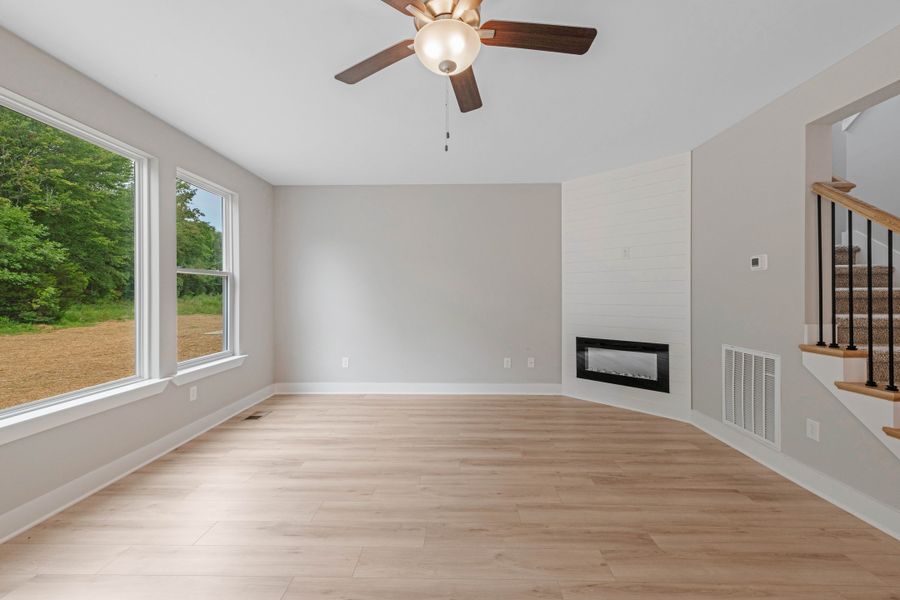 Representative unfurnished interior of a home built from the Two Story Farmhouse by Norfleet Builders in Cambria, White House (Image 6).