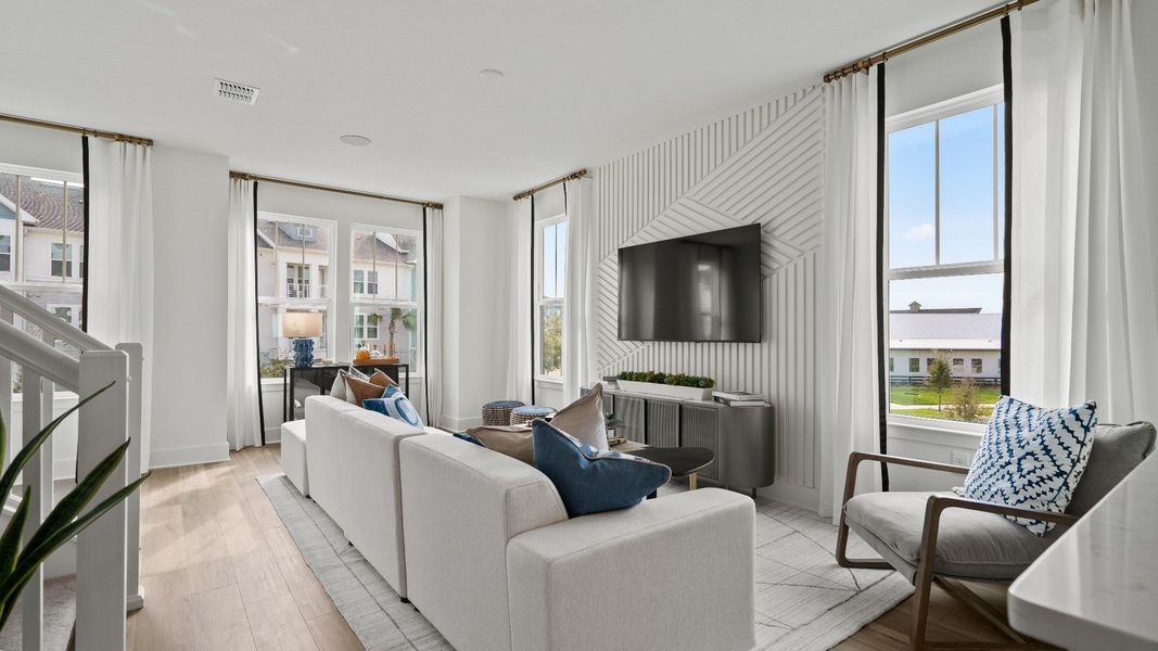 Furnished interior view inside a new home in Parkview at Hamlin, Winter Garden (Image 13).