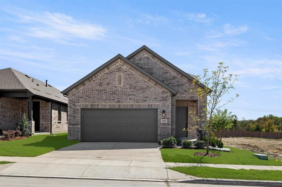 Front exterior of a new home in , Forney, TX, highlighting curb appeal (Image 1). Front exterior of a new home in , Forney, TX, highlighting curb appeal (Image 1).