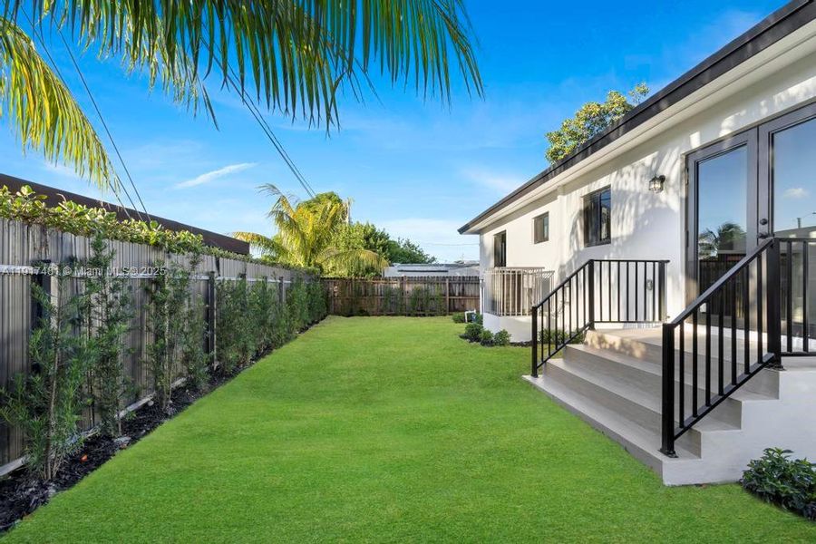 Exterior details and patio area of a home in , Miami (Image 21). Exterior details and patio area of a home in , Miami (Image 21).