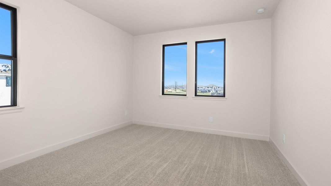Spacious, unfurnished interior of a new home in Sienna, Missouri City (Image 14).