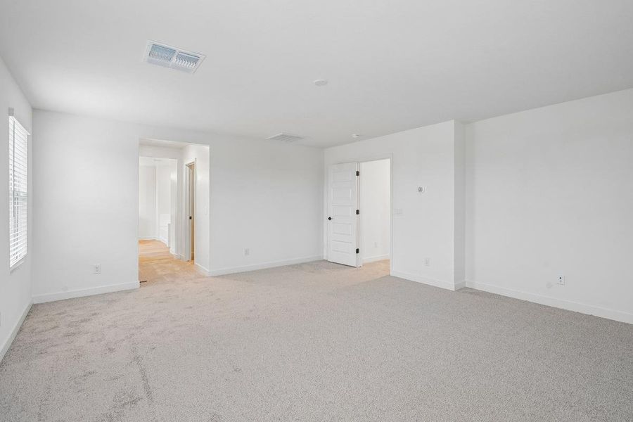 Spacious, unfurnished interior of a new home in The Enclaves at Sonrisa, Queen Creek (Image 9).