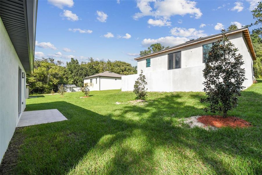 Exterior details and patio area of a home in , Brooksville (Image 34).