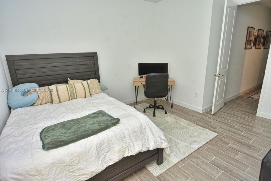 Furnished interior view inside a new home in Central Park, Port St. Lucie (Image 43).