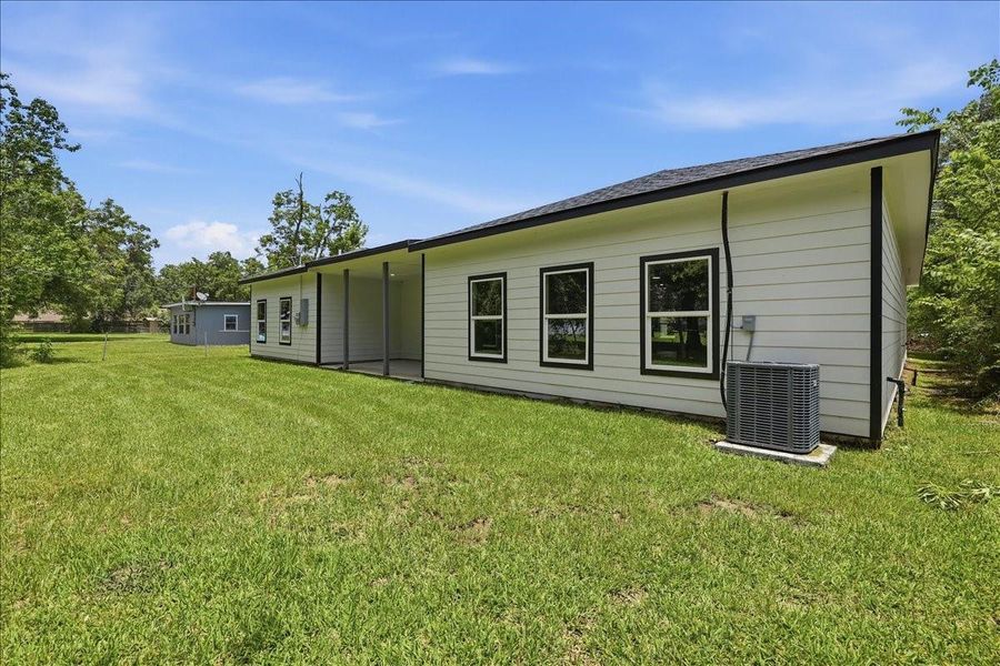 Plenty of green space in the backyard for pets, play, or future landscaping projects. Plenty of green space in the backyard for pets, play, or future landscaping projects.
