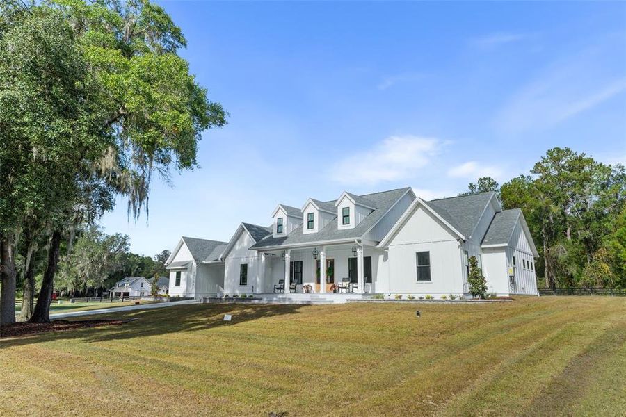 Front exterior of a new home in , Newberry, FL, highlighting curb appeal (Image 25). Front exterior of a new home in , Newberry, FL, highlighting curb appeal (Image 25).