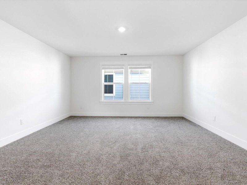 Spacious, unfurnished interior of a new home in The Coves at Lakes of Cane Bay, Summerville (Image 25). Spacious, unfurnished interior of a new home in The Coves at Lakes of Cane Bay, Summerville (Image 25).