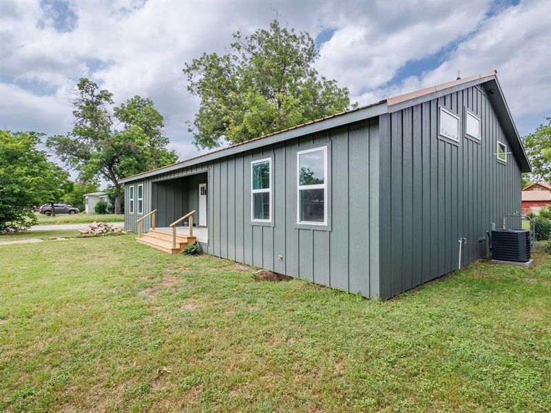 Exterior details and patio area of a home in , Brownwood (Image 22).