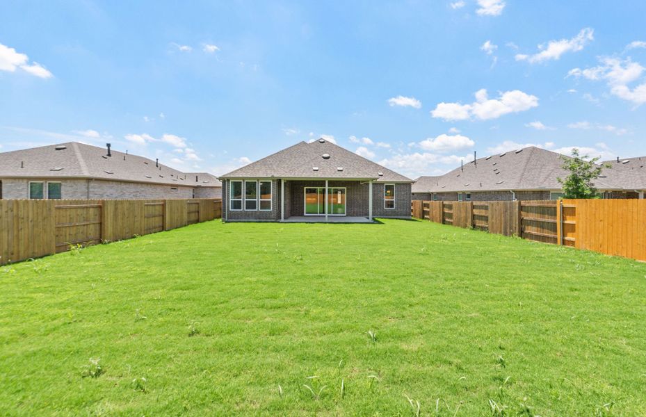 Exterior details and patio area of a home in 6 Creeks, Kyle (Image 25).