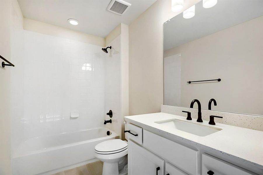 Bathroom with vanity and shower / bath combination Bathroom with vanity and shower / bath combination