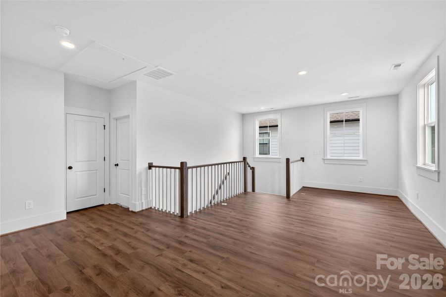 Fun flowing second floor loft space with open railing. Fun flowing second floor loft space with open railing.