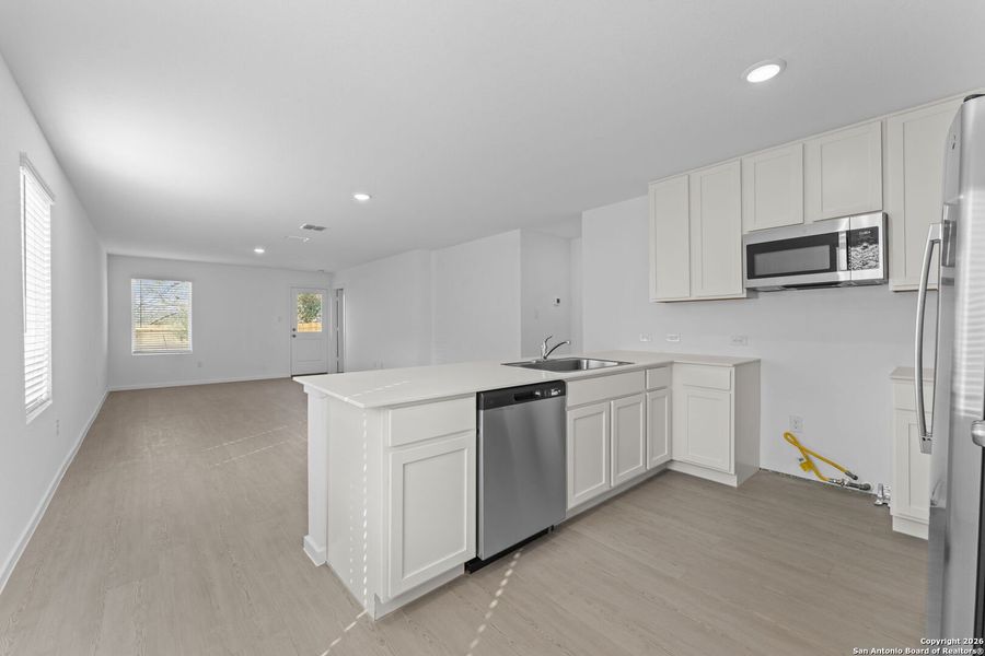 Furnished interior view inside a new home in Torian Village: Belmar Collection, San Antonio (Image 5).