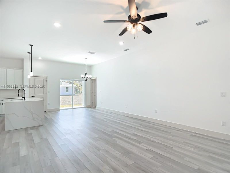 Spacious, unfurnished interior of a new home in , Port Charlotte (Image 19).