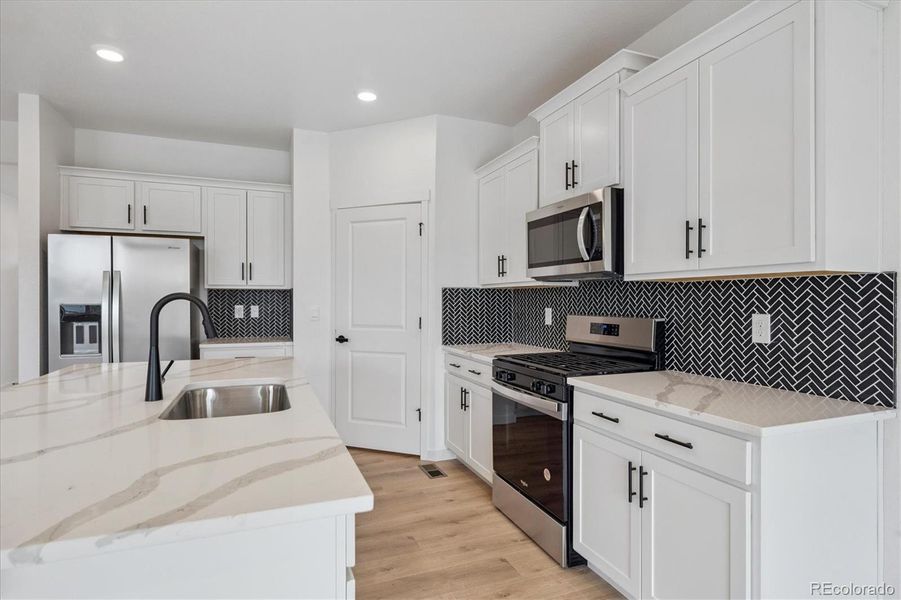 Furnished interior view inside a new home in Timberleaf, Thornton (Image 9).