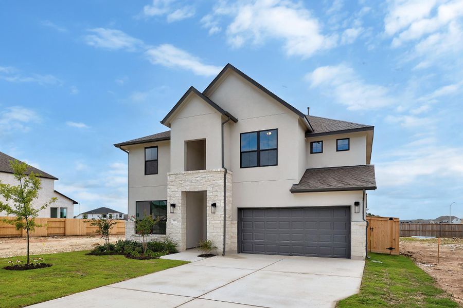 Front exterior of a new home in Nolina, Georgetown, TX, highlighting curb appeal (Image 22). Front exterior of a new home in Nolina, Georgetown, TX, highlighting curb appeal (Image 22).