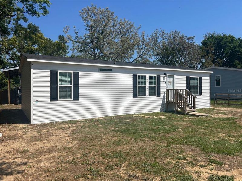 Exterior details and patio area of a home in , Fruitland Park (Image 2). Exterior details and patio area of a home in , Fruitland Park (Image 2).