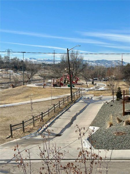 Across from Nettie Moore park/playground, Dry Gulch park open space