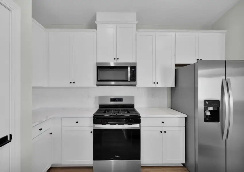 Each kitchen includes stainless steel appliances