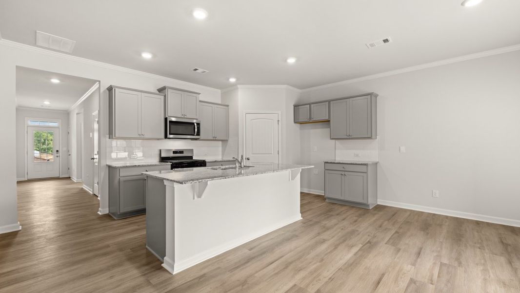 Representative furnished interior of a home built from the Cali by D.R. Horton in Sheffield Highlands, Dallas (Image 7).