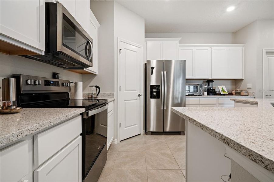 Furnished interior view inside a new home in Towns at Woodsdale Villas, Wesley Chapel (Image 15).