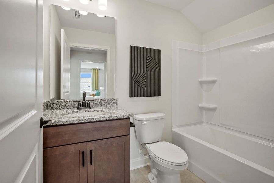 Representative furnished interior of a home built from the Compass by Del Webb in Del Webb Carolina Ridge, Midland (Image 37).