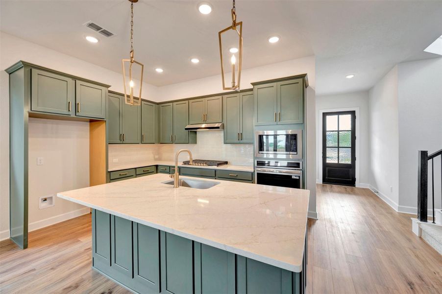 Furnished interior view inside a new home in Sienna - Landmark Row Collection, Missouri City (Image 8).