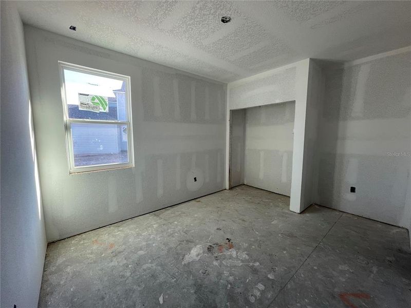 Spacious, unfurnished interior of a new home in Magnolia Series at Seminole Palms, Palm Coast (Image 13).