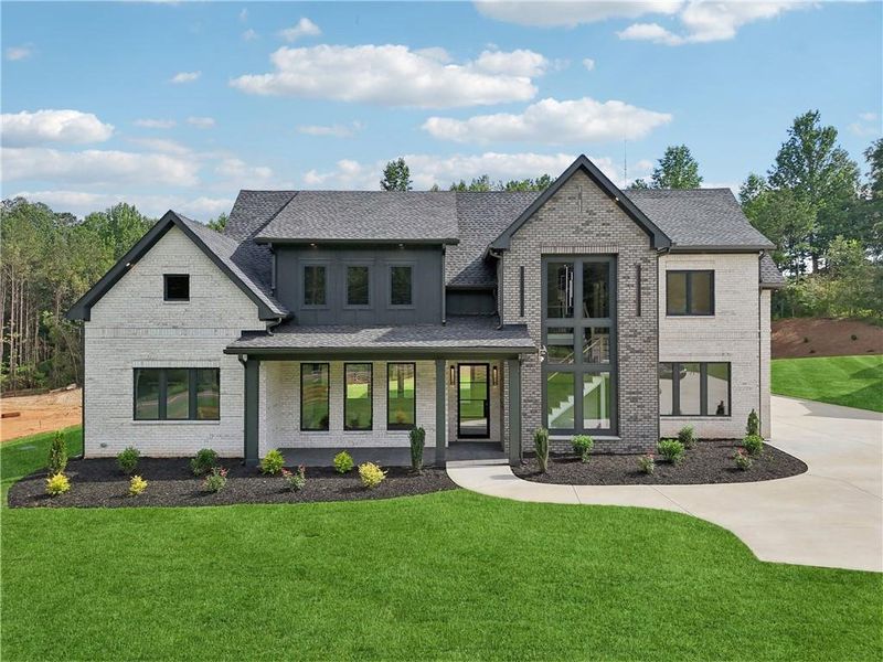 Front exterior of a new home in , Braselton, GA, highlighting curb appeal (Image 41).